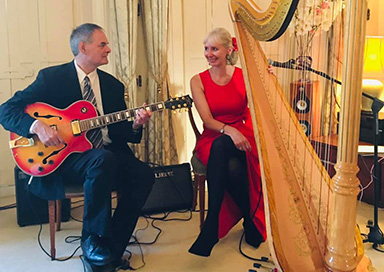 Harp and Guitar Duo with Vocals